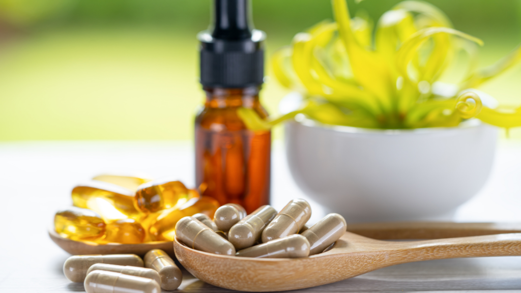 vitamins and supplements on a wooden table