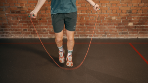 a person is jumping on a skipping rope