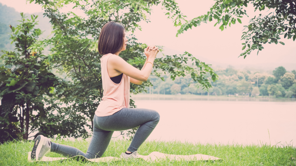 a person  doing squats in an outdoor park