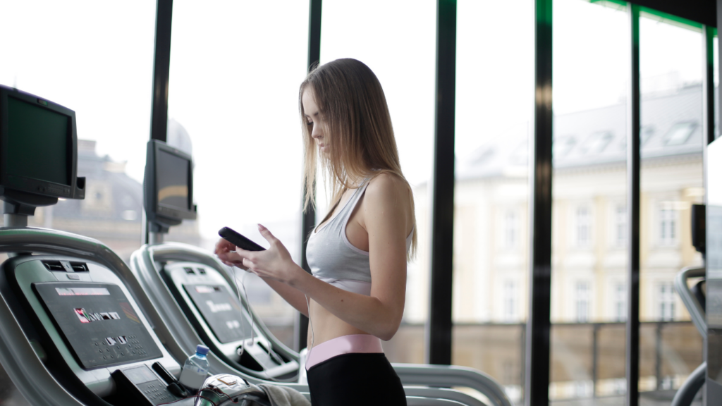 a person is on a treadmill in a gym